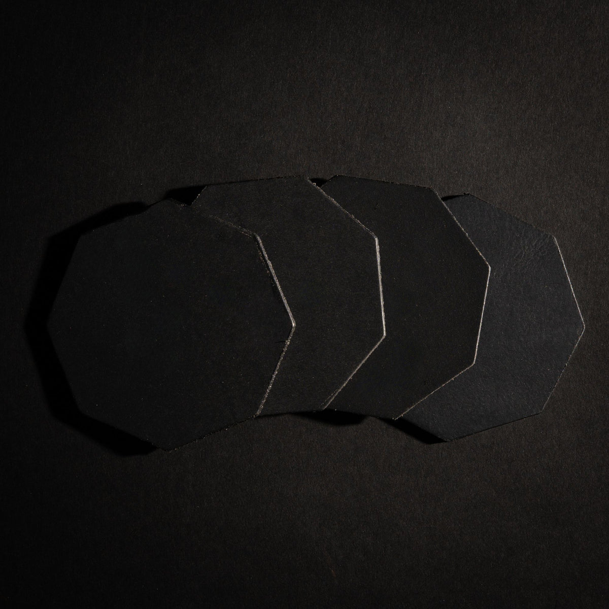 Octagon distressed leather coasters in black