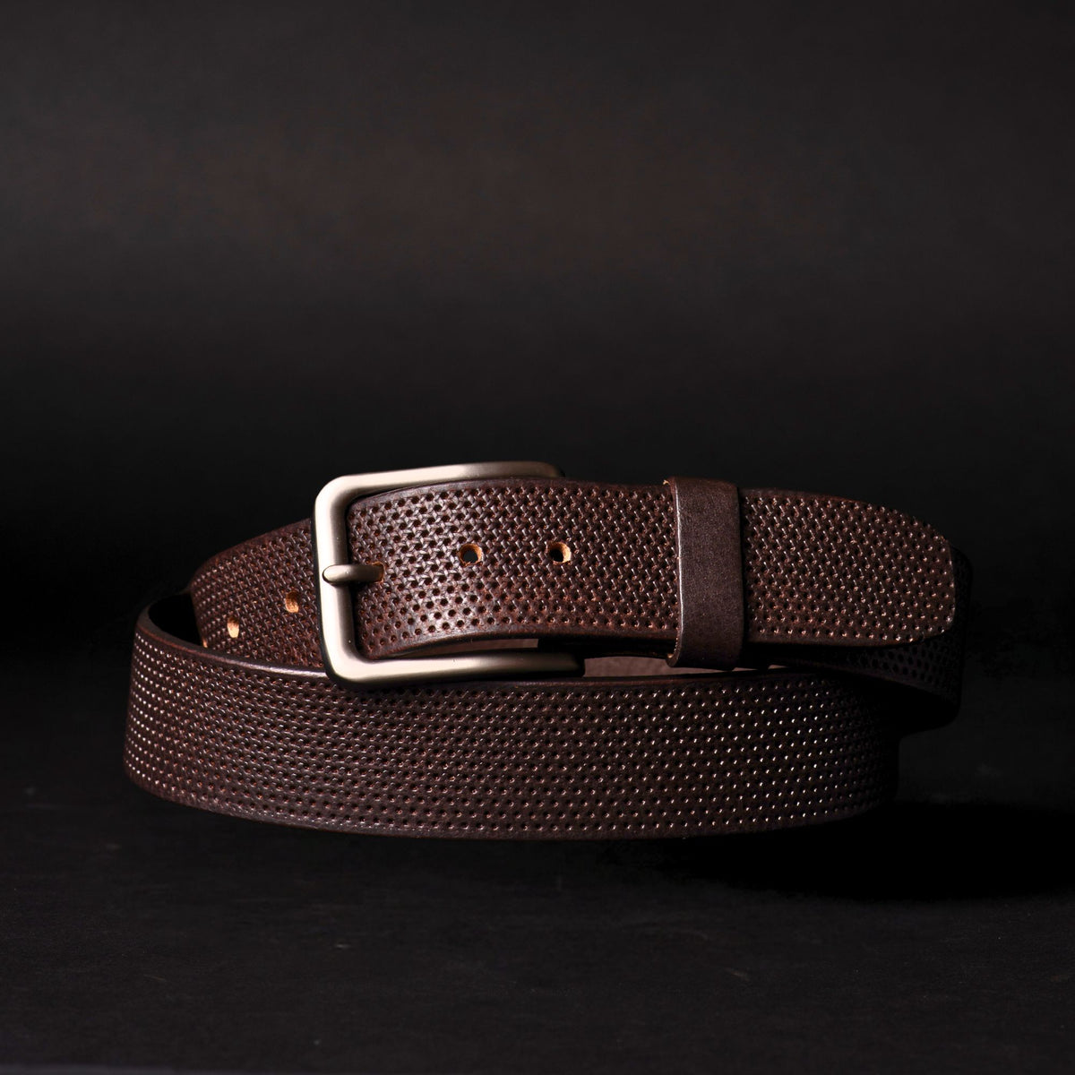 The Matrix black perforated full-grain leather belt