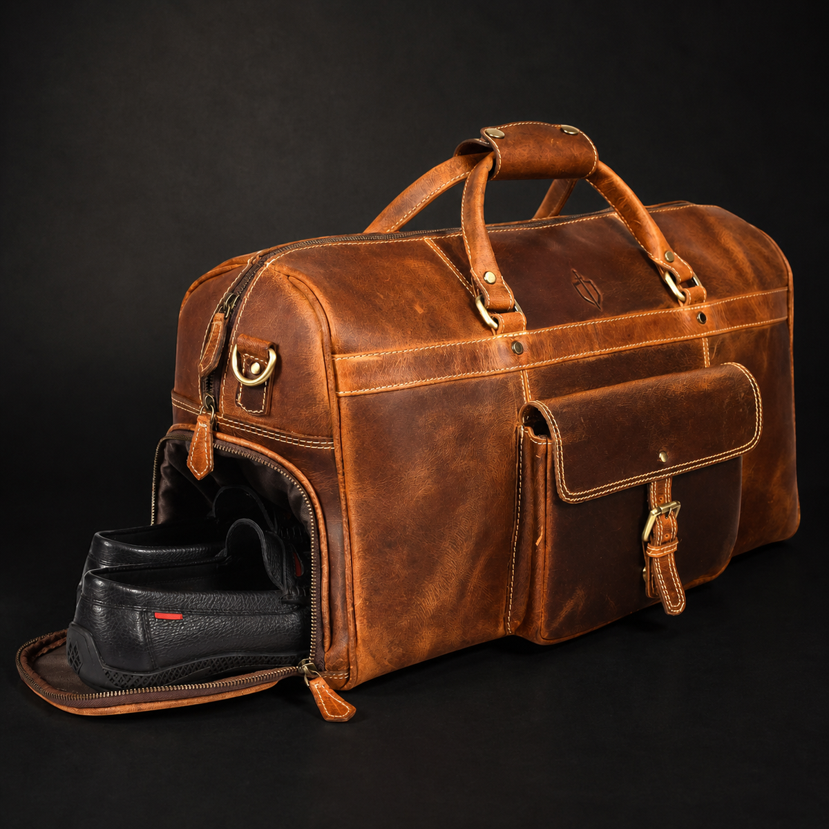 The Voyager cognac distressed full-grain leather duffle bag