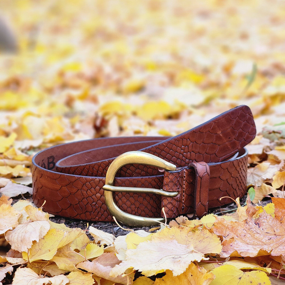 Snake skin embossed full-grain leather belt
