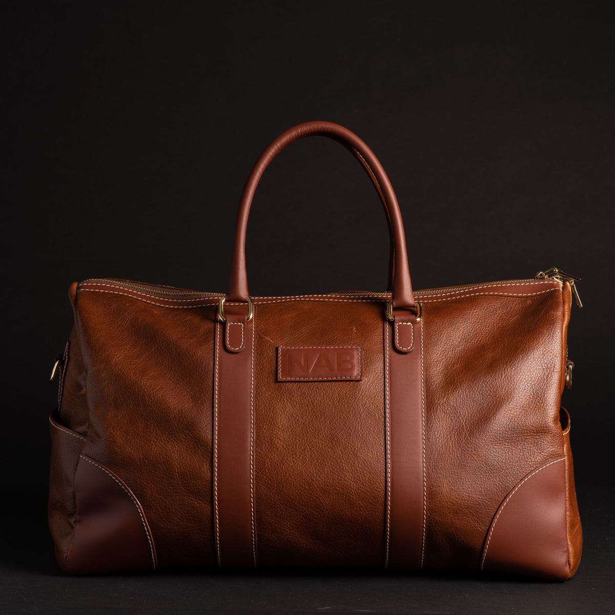 The Shield black full-grain leather duffle bag