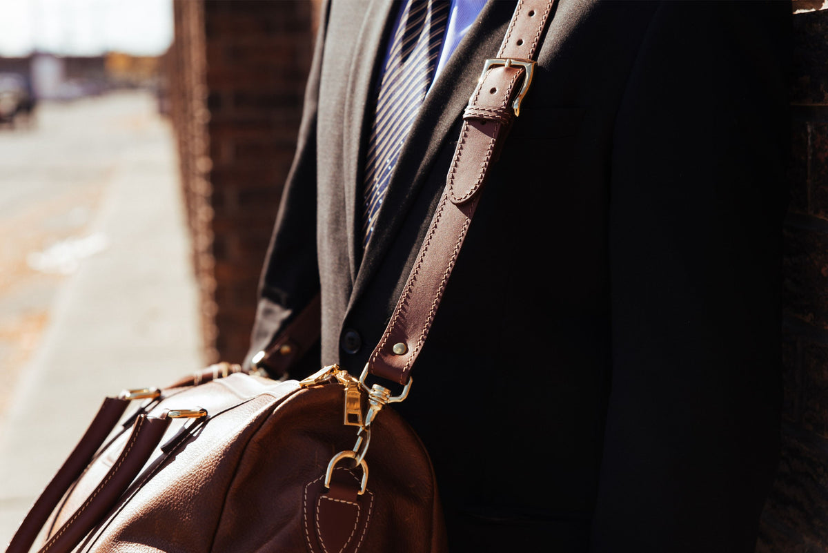 The Shield black full-grain leather duffle bag