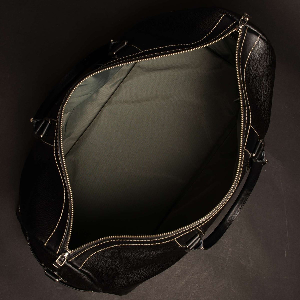 The Shield black full-grain leather duffle bag