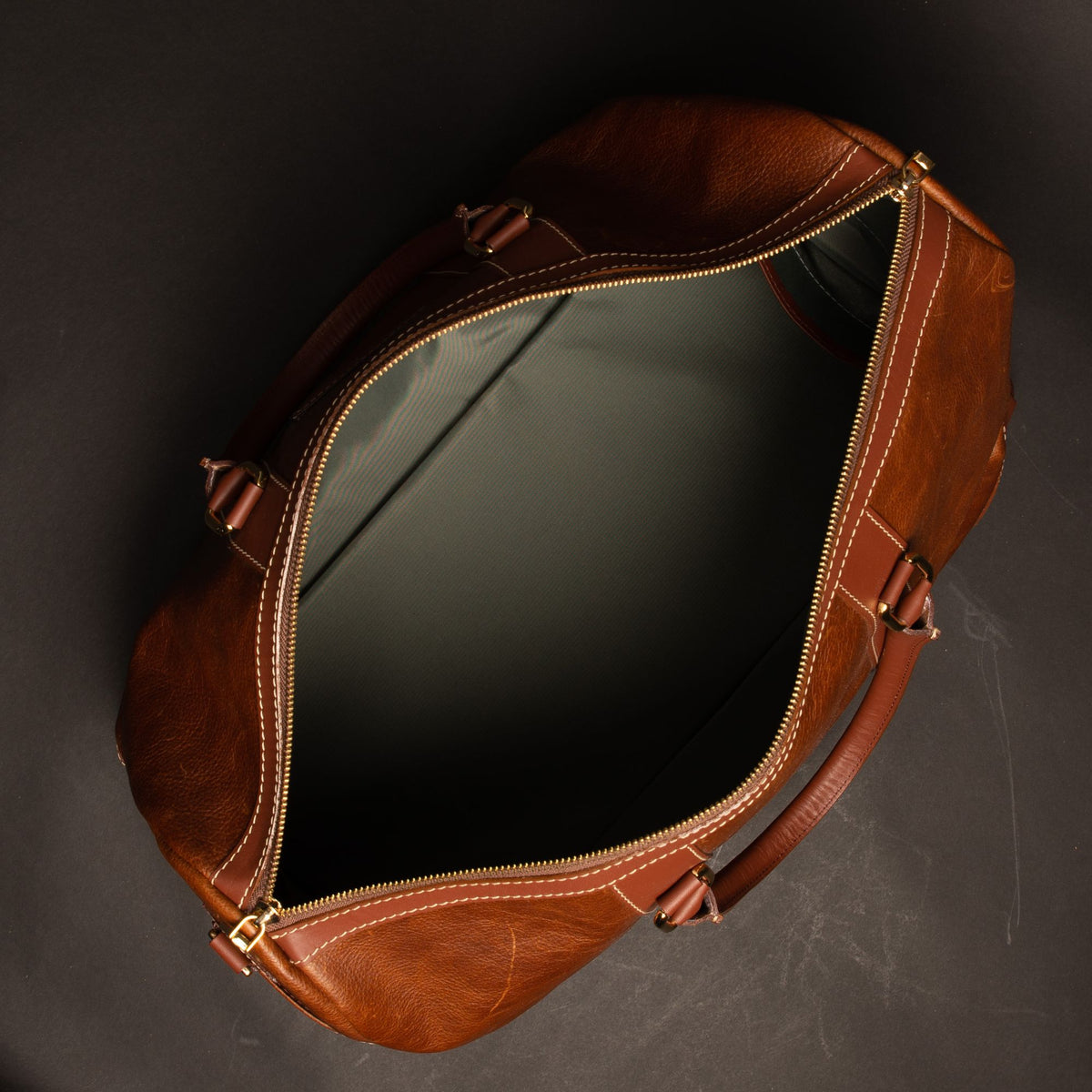 The Shield cognac full-grain leather duffle bag