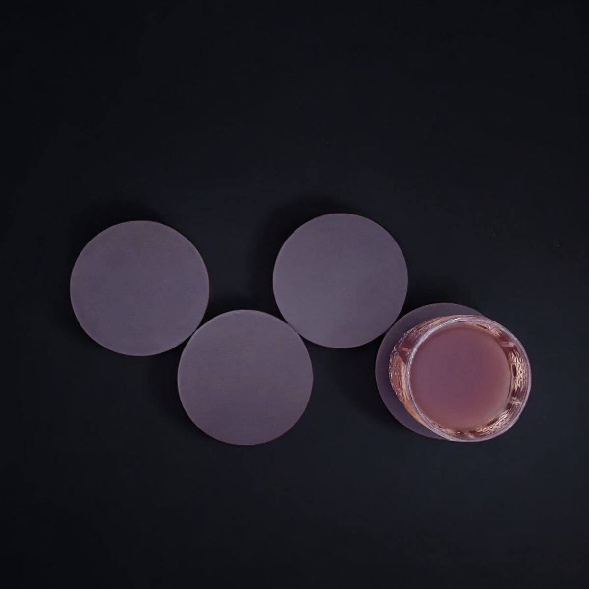 Round distressed leather coasters in brown