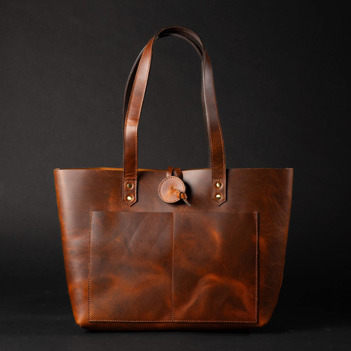 Tolredo cognac leather tote bag with leather closure