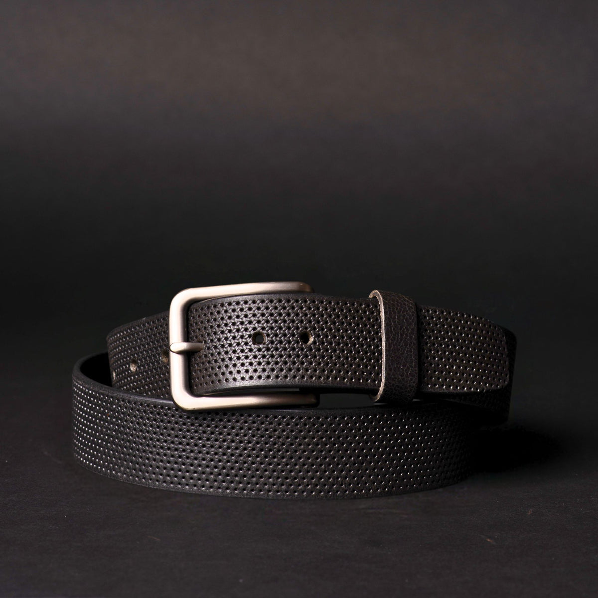 The Matrix black perforated full-grain leather belt