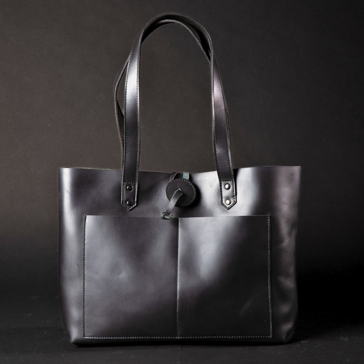 Tolredo black leather tote bag with leather closure