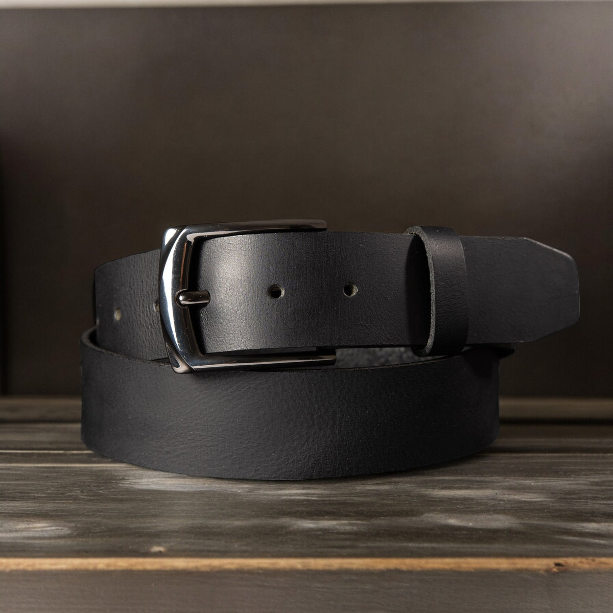 The PPK black leather belt with black gunmetal buckle
