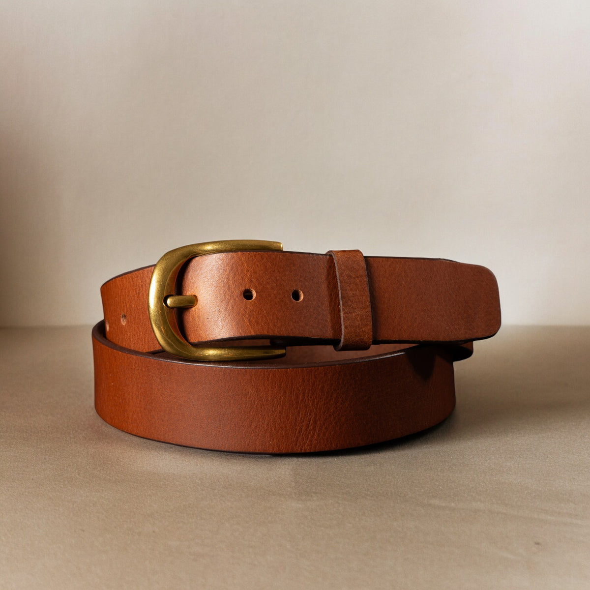 Liora tan leather belt with gold buckle