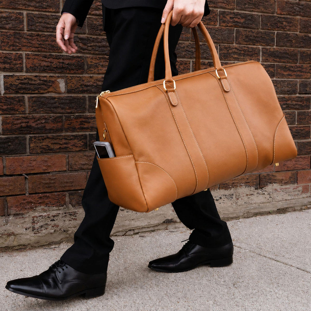 The Shield English tan full-grain leather duffle bag