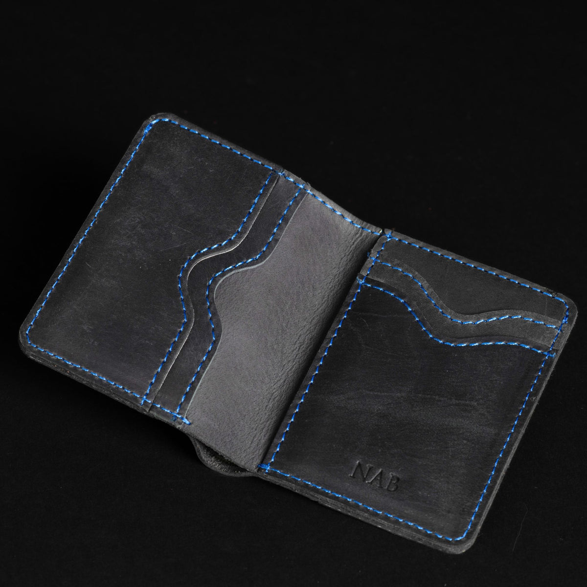 The Diablo black leather card holder with red stitching
