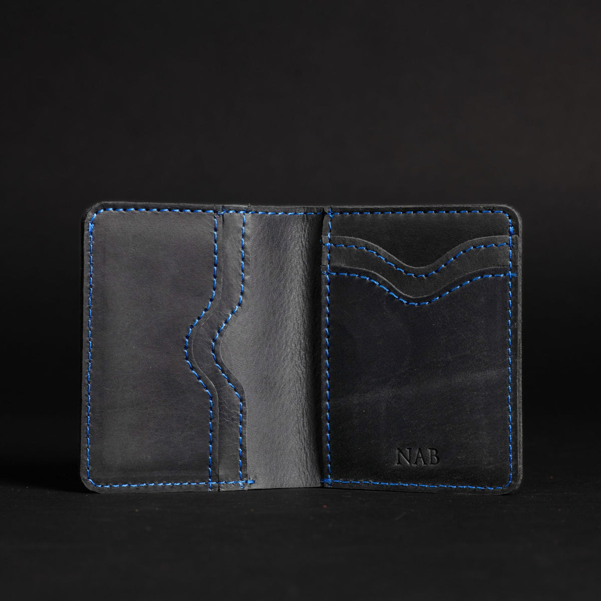 The Diablo black leather card holder with red stitching
