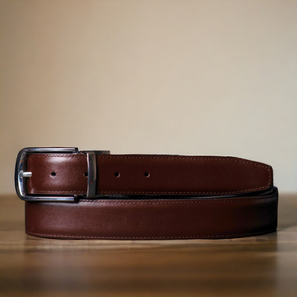 The Harvey Dent reversible stitched feather edged leather belt