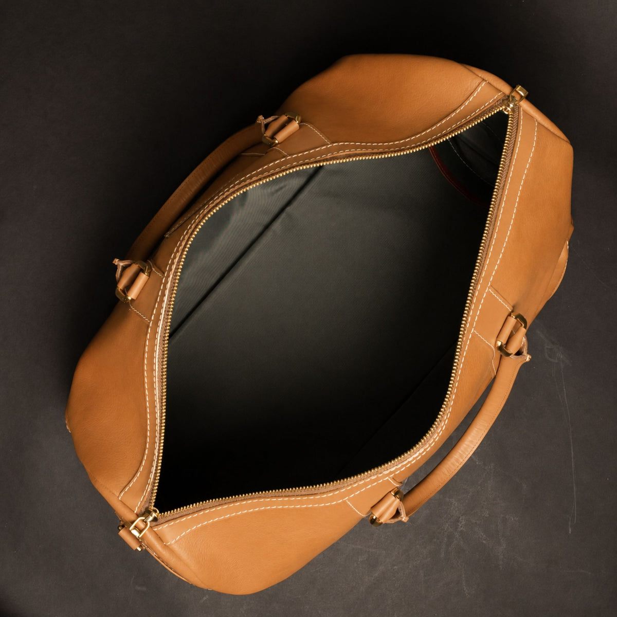 The Shield English tan full-grain leather duffle bag