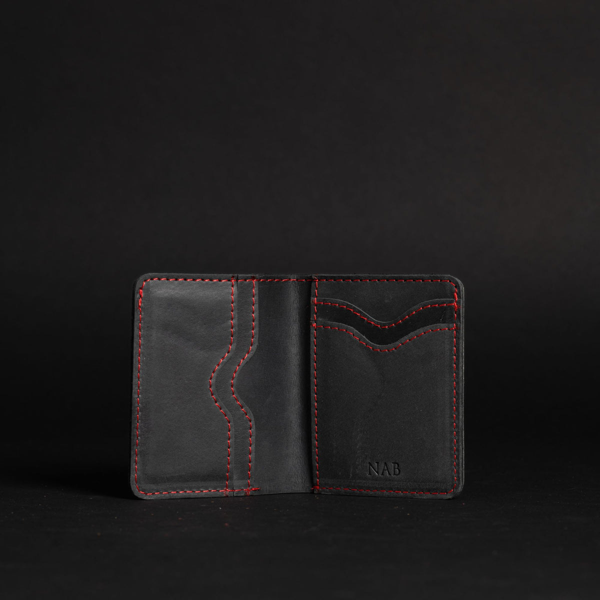 The Diablo black leather card holder with red stitching