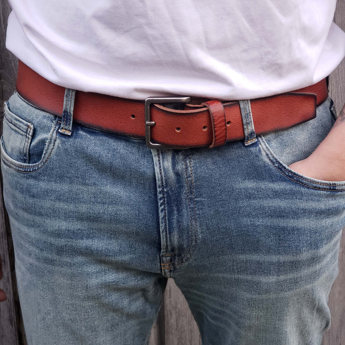 The Mountain leather belt with charred edges
