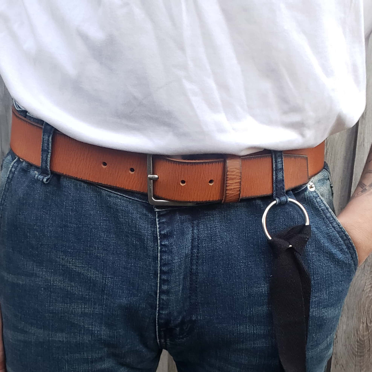 The Mountain leather belt with charred edges