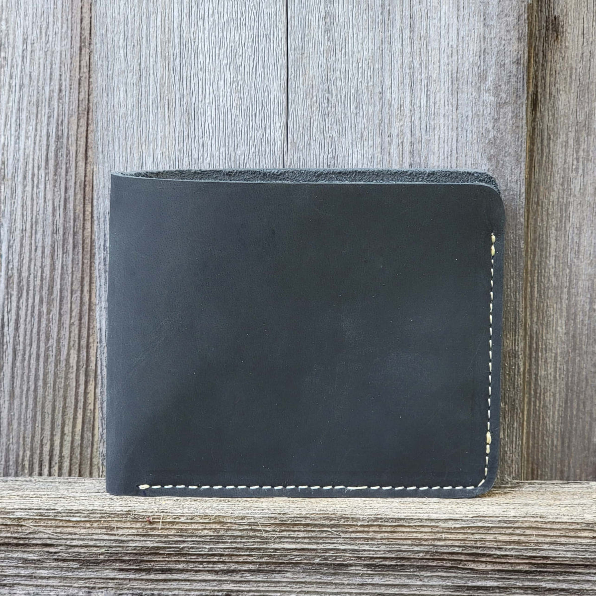 Full-grain leather wallet with coin pouch in black