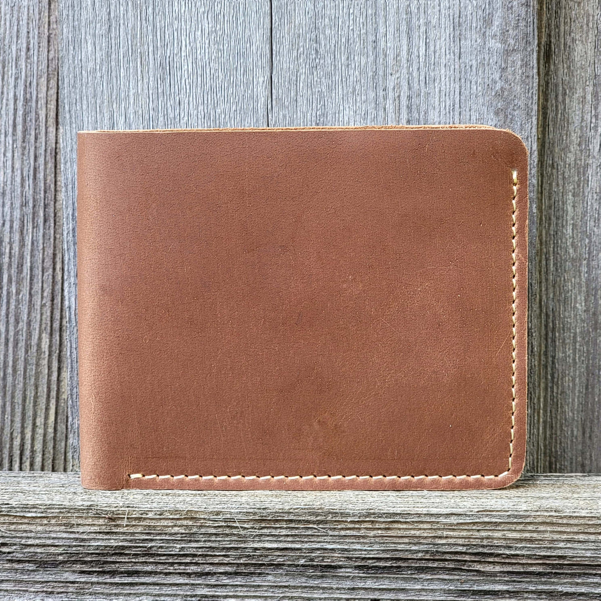 Full-grain leather wallet with coin pouch in cognac