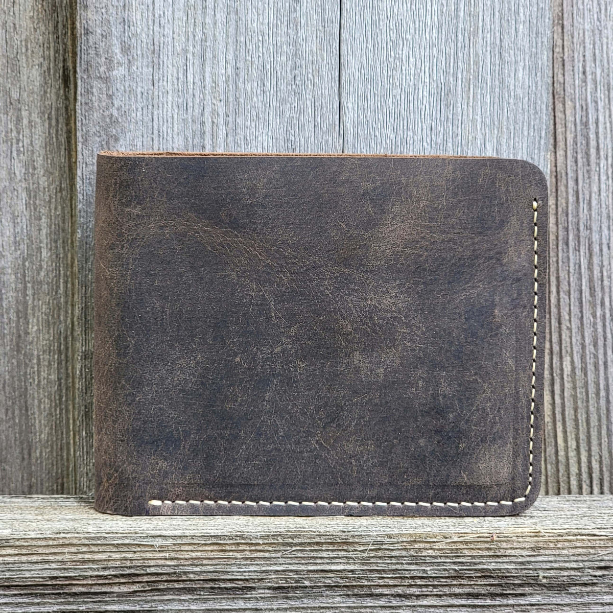 Full-grain leather wallet with coin pouch in brown