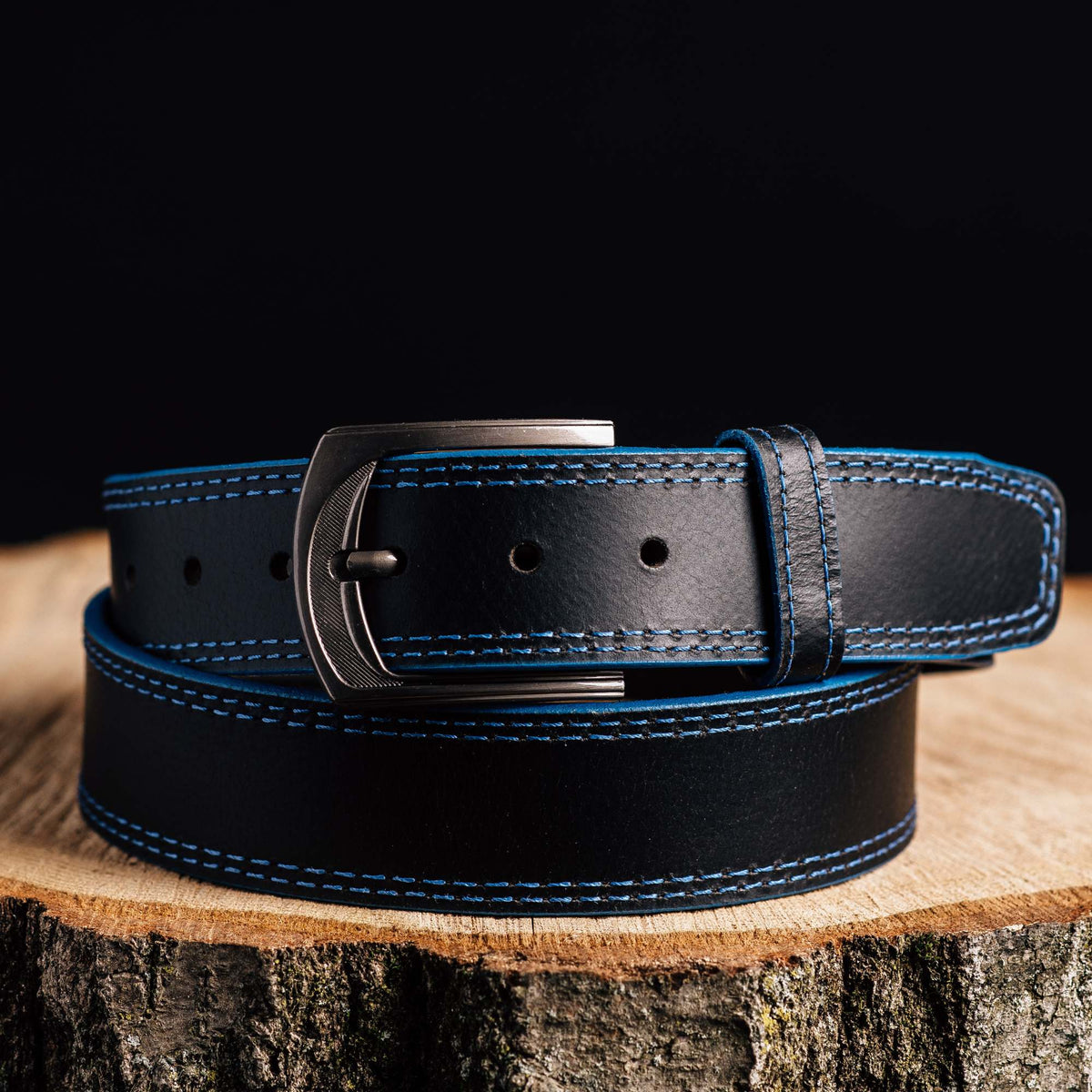 The Poseidon black full-grain leather belt with blue stitching