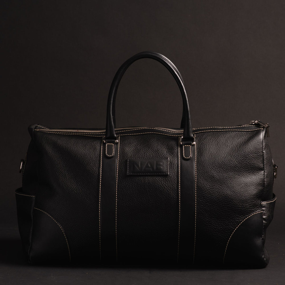 The Shield black full-grain leather duffle bag