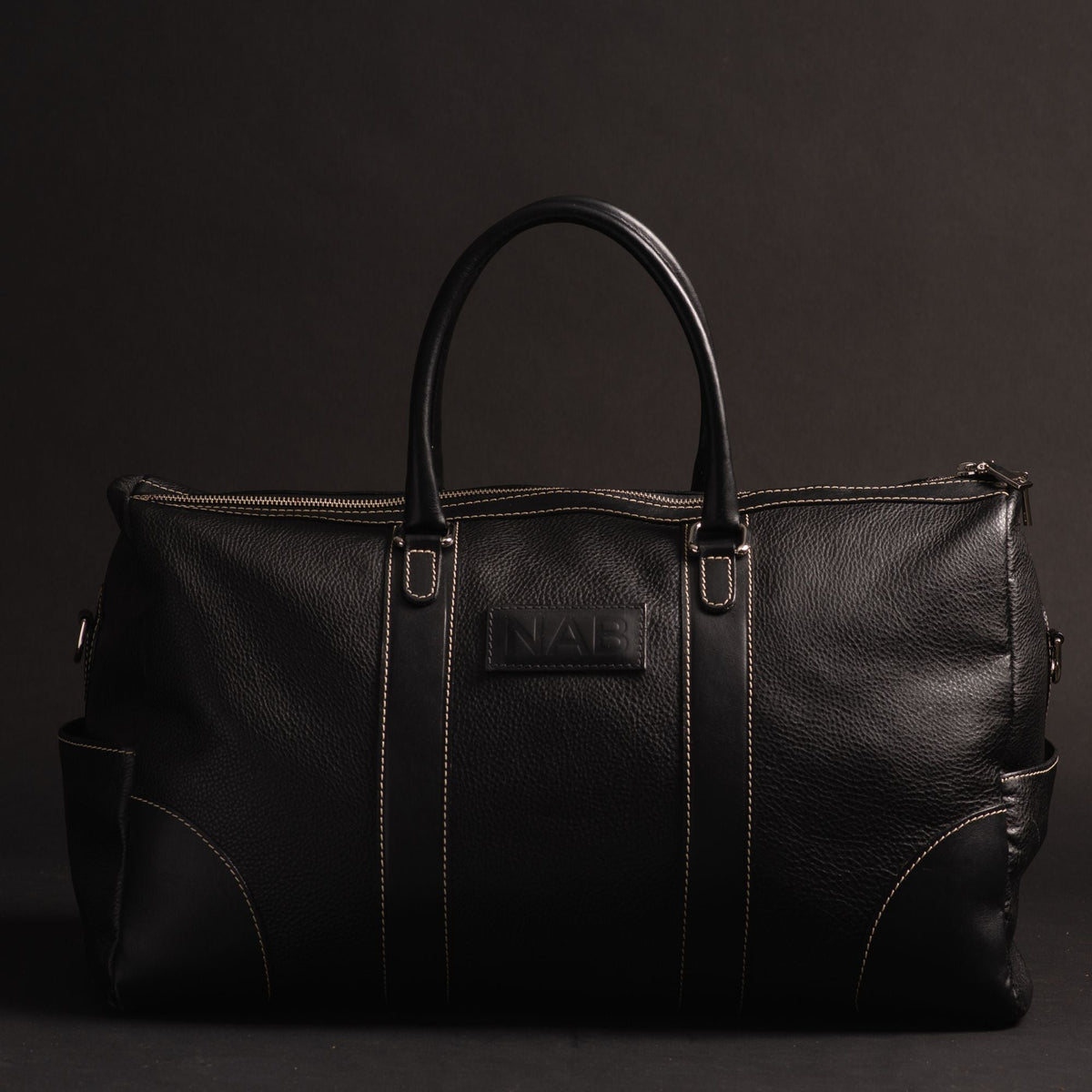The Shield cognac full-grain leather duffle bag