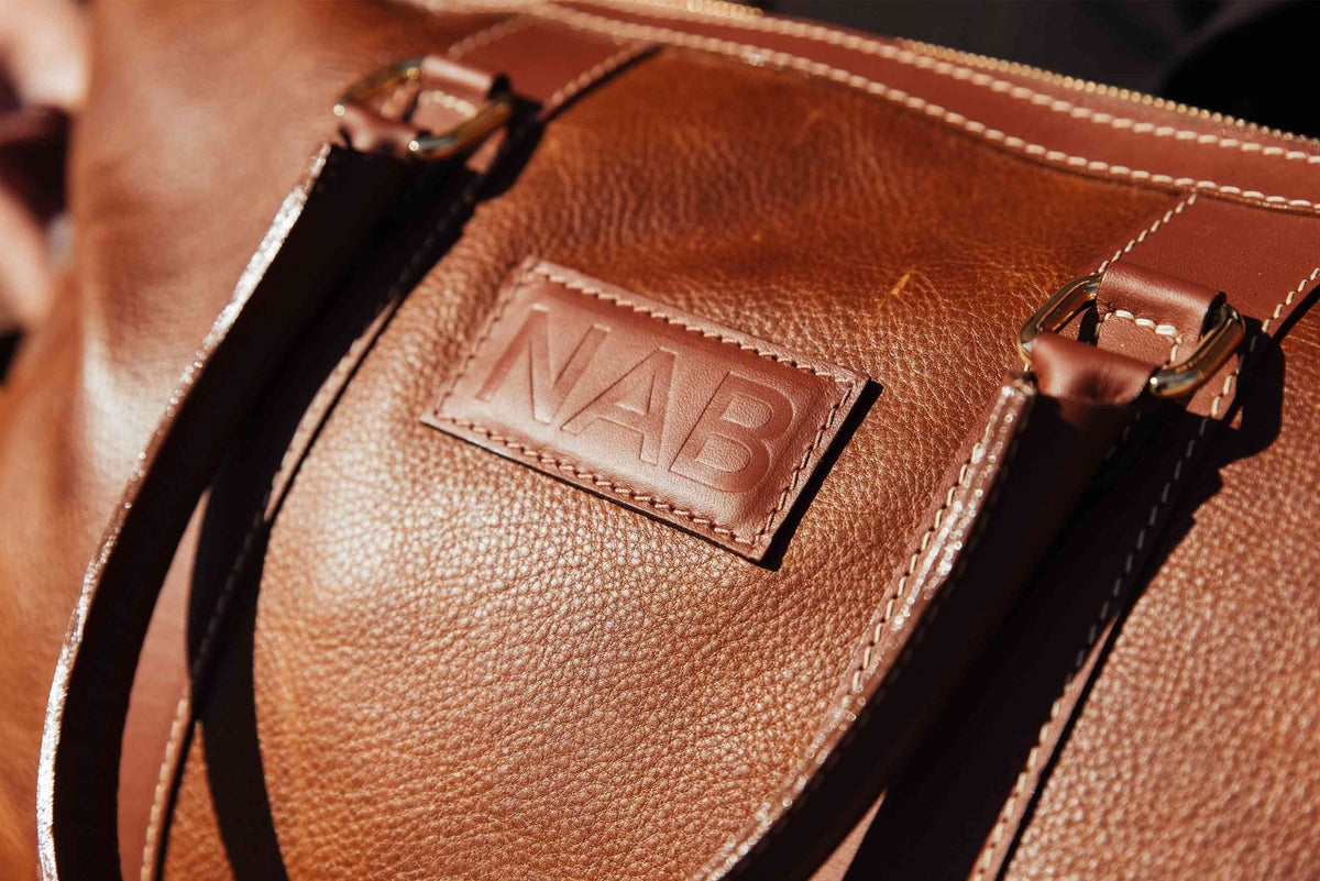 The Shield cognac full-grain leather duffle bag